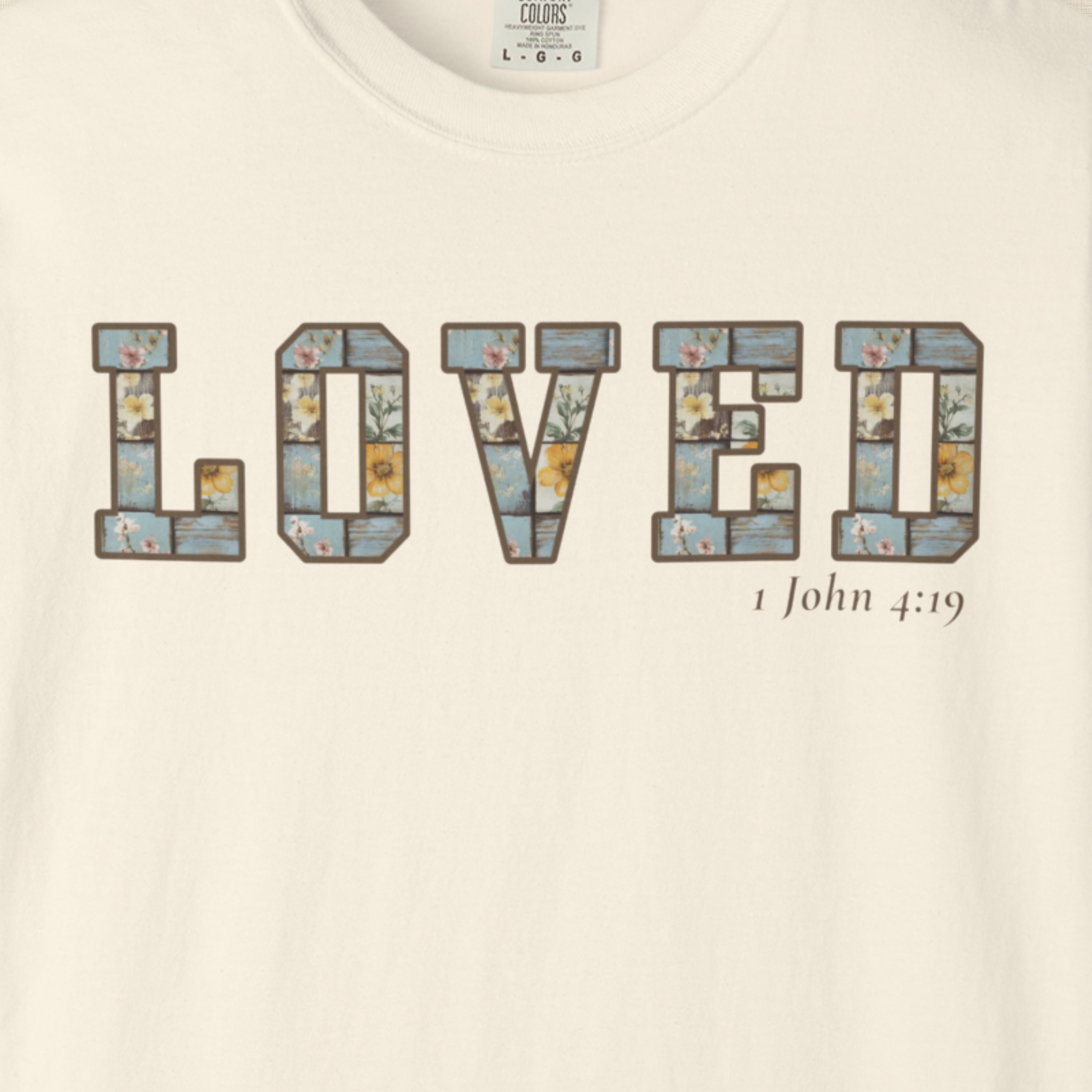 Loved Christian Tee – 1 John 4:19 Faith Graphic Shirt